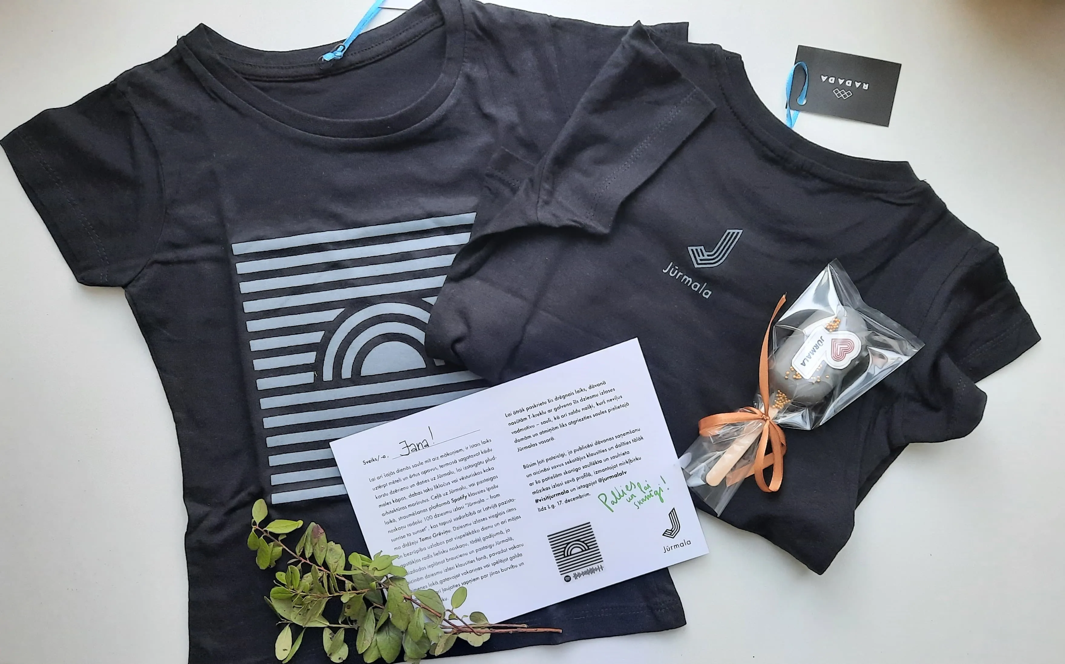 t-shirt with printed logo of jurmala city with postcard and brench decor